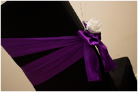 Purple satin with white rose